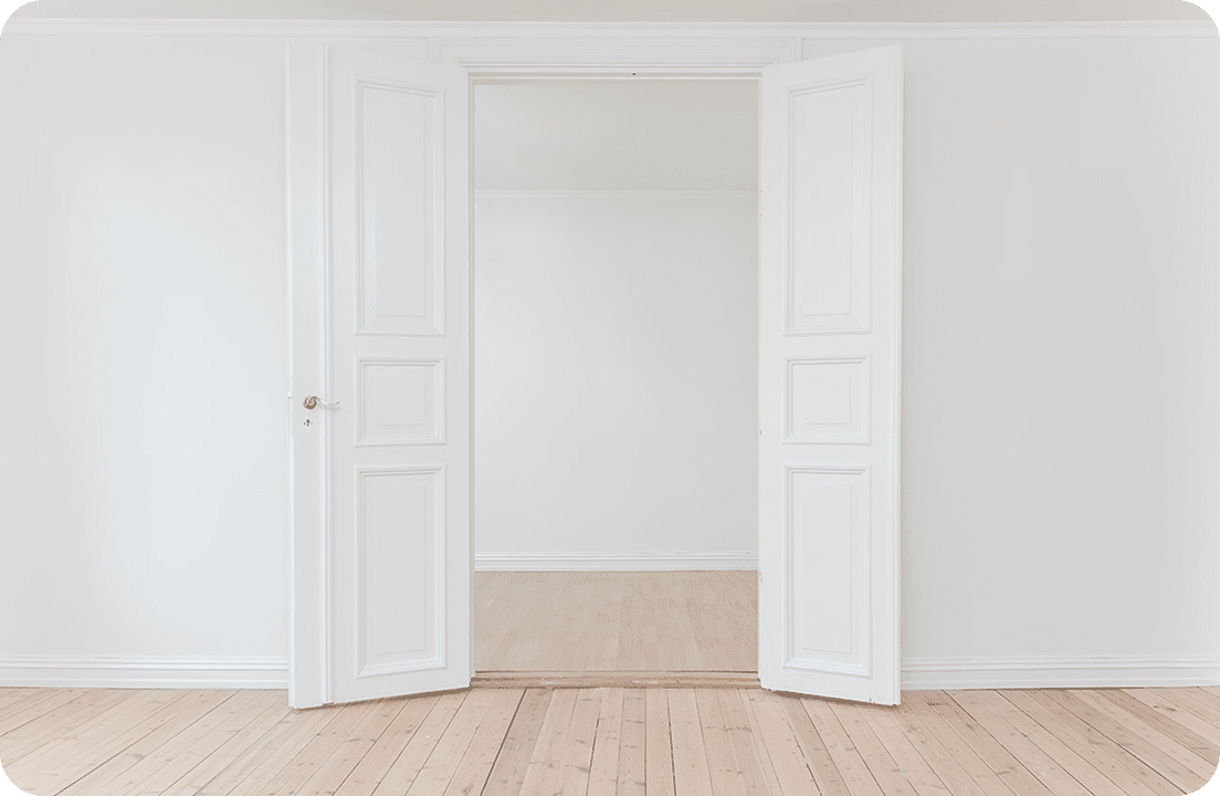 Empty room with open double doors