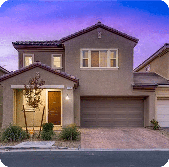 Modern house at twilight with driveway