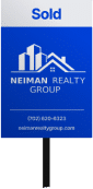 Real estate sold sign displayed